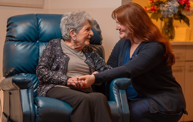 nurse caring for resident