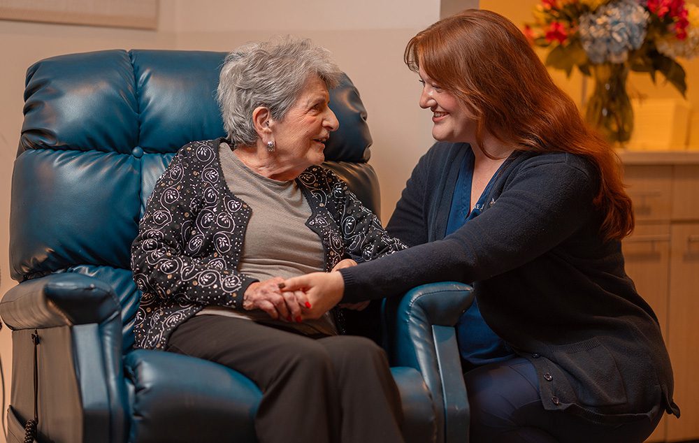 nurse caring for resident